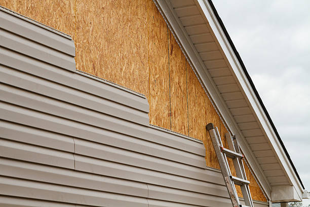Professional Vinyl Siding technician working in White Plains, NC